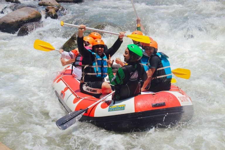 Travelers during a white water river rafting